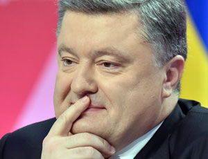 La trasformazione del presidente ucraino Petr Poroshenko: dal re del cioccolato al barone delle armi / Il presidente ucraino Poroshenko vende i lanciabombe ai miliziani del Donbass